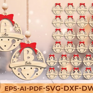 May include: Wooden Christmas ornaments with letters A through Z, each with a red bow. Two ornaments are hanging, one with the letter "A" and the name "Alex", and the other with the letter "B" and the name "Bella". The ornaments have star and snowflake cutouts.