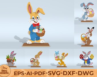 Könnte beinhalten: Holzfiguren von Osterhasen in verschiedenen Posen, die Körbe mit Eiern oder Karotten halten. Die Hasen sind in verschiedenen Farben, darunter Blau, Braun und Grau. Der Text "EPS-AI-PDF-SVG-DXF-DWG" ist ebenfalls enthalten.