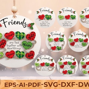 May include: A white wooden ornament with the word "Friends" and holly accents. It features red and green heart-shaped name tags connected by heartstrings. Additional ornaments with similar designs are also shown.