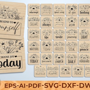 May include: A selection of wooden plaques featuring floral designs and motivational quotes in black. Two larger plaques display "Be kind to yourself" and "Choose joy today." Smaller plaques include phrases such as "Always," "Peace," and "Soul."