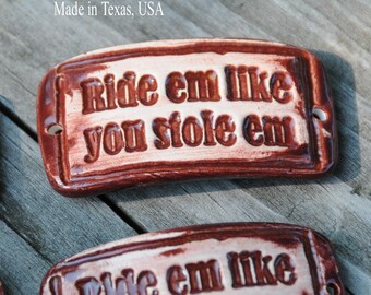 Ceramic Pottery Cuff Bead "Ride em like you stole em" a handmade pottery cuff bead with an attitude in Rustic Red