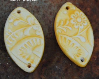 2 Handmade Pottery Beads in Bright Yellow in a folk design