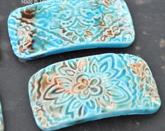 Blue and Brown pottery cuff bead in a paisley pattern