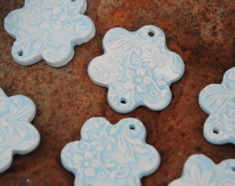 2 Handmade Pottery Beads with glazed Backs for Essential Oils in a soft blue with a Floral Texture