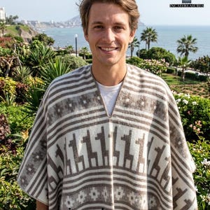 May include: A beige and brown poncho with a geometric llama pattern. The poncho has a V-neck design and horizontal stripes. The image also includes the text "www.incastreasures.com".