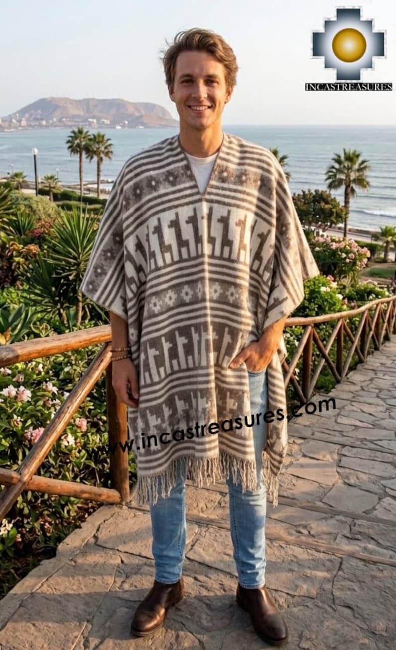 May include: A beige and brown patterned poncho with fringe, featuring a geometric design and llama figures. The poncho is worn with blue jeans and brown boots. The image includes the text "incastreasures.com".
