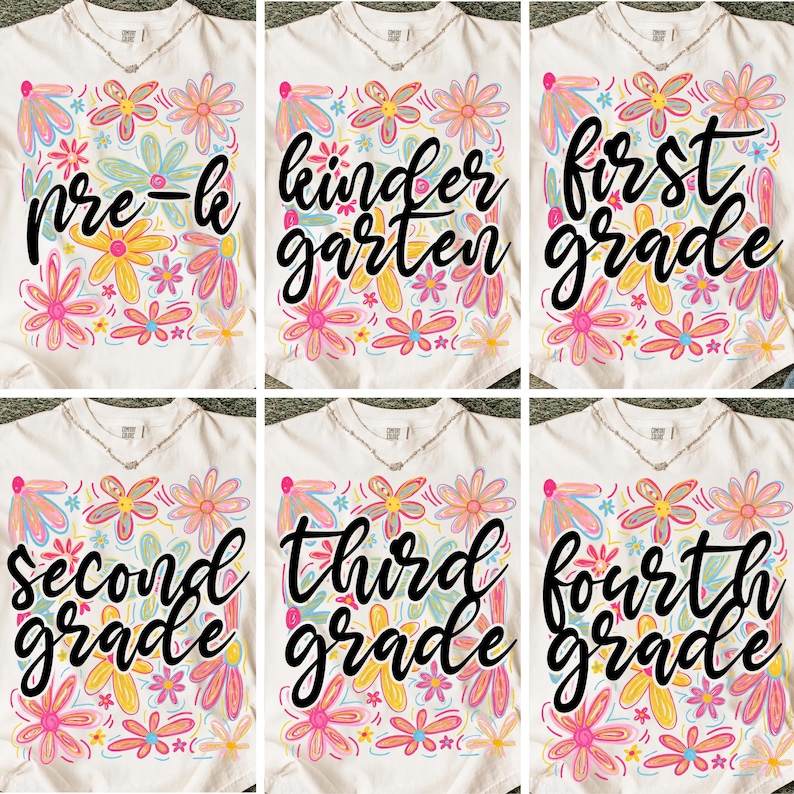 May include: White t-shirts with floral designs and grade level text. The shirts feature colorful flowers in pink, yellow, and blue. The grade levels include pre-k, kindergarten, first grade, second grade, third grade, and fourth grade.