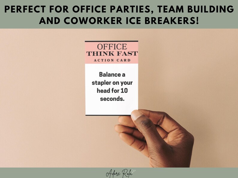 May include: A pink card with the text "Office Think Fast Action Card" and the instructions "Balance a stapler on your head for 10 seconds."