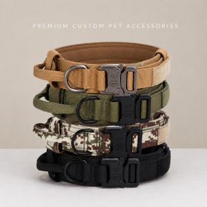 May include: A stack of four tactical pet collars featuring heavy-duty metal quick-release buckles and D-rings. The collars come in tan, olive green, digital camouflage, and black. The text PREMIUM CUSTOM PET ACCESSORIES is visible at the top.