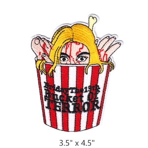 May include: An embroidered iron-on patch featuring a red and white striped bucket with a bloody woman's head and hands sticking out. The text "Friday the 13th Bucket of Terror" is embroidered on the bucket.