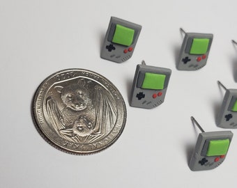 Pair of retro hand-held gamer stud earrings