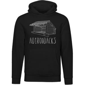 May include: Black hooded sweatshirt with a white outline of a cabin and the text "ADIRONDACKS" below it.