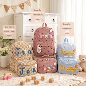 May include: Three sets of corduroy backpacks and lunch bags in khaki plaid, pink with berry patterns, and light blue. Each item features personalized names in colorful or gold raised lettering, small flower accents, and a plush bunny charm.