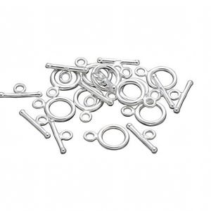 May include: Silver-toned metal toggle clasps with a round ring and a bar. The clasps are designed for jewelry making and crafting.
