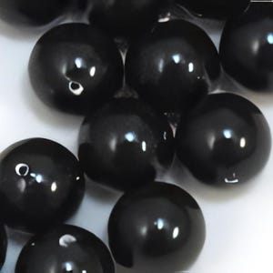 10mm Mystic Black Swarovski® crystals Pearl, Mystic Black 10mm round (5810). Sold per pkg of 10
