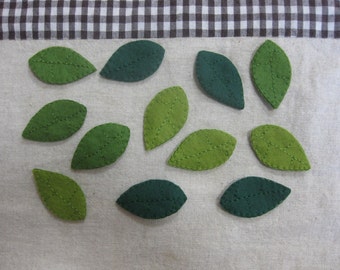 Hojas verdes de fieltro