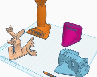 May include: A collection of five 3D printed objects including an orange pedestal with text, a light peach branching structure, a magenta wedge-shaped piece, a light blue geometric housing, and an orange cylindrical component with a long thin extension.