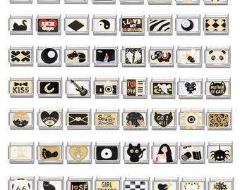 May include: A collection of silver-toned charm beads with various designs. The charms feature images such as a spider web, a crescent moon, a star, and text like "I Love My Nana" and "Go 2 Hell". Other charms have a cat, a guitar, and a panda.