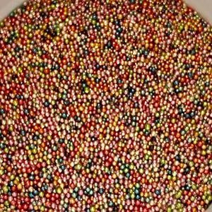 Perlas de caviar coloridas no comestibles para uñas o arte