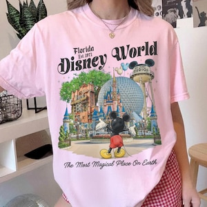 May include: A rustic wooden sign with the text "Welcome to our home" in white lettering. The sign features a distressed finish and a simple, inviting design, perfect for a front porch or entryway.