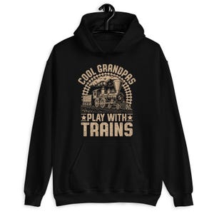 a black hoodie with a train on it