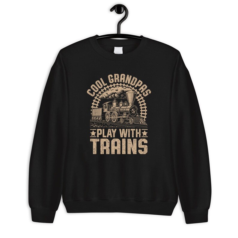 a black sweatshirt with a train on it