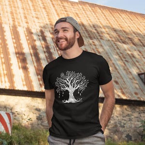 a size chart for a sweatshirt with a plant on it