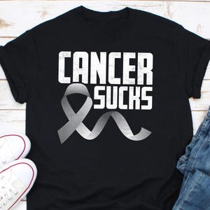 Cancer Sucks In Every Color T-shirt, Nobody Fights Alone, Cancer Fighter Shirt, Warrior T-shirts, Cancer Awareness T-shirt, Cancer Survivor