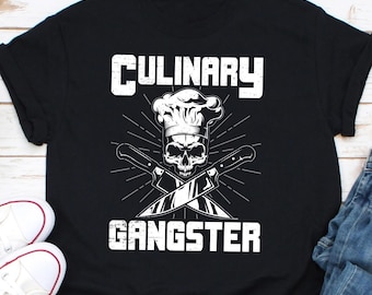 May include: Black t-shirt with a white graphic of a chef's hat and skull with crossed knives. The text "Culinary Gangster" is below the graphic.