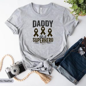 Daddy Of A Superhero Shirt,  Childhood Cancer Survivor Gift, Childhood Cancer Shirt, Kids Cancer Awareness Shirt,  Gold Ribbon Shirt