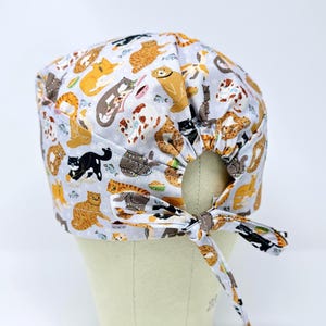 Cat surgical cap with tie back for men. Funny skull tie-back style surgical scrub hat.
