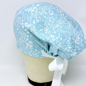 Floral Euro Scrub Cap with Ties. Blue European Satin Lined option scrub caps for women.