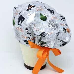 Trick or Treat Euro Scrub Cap with Ties. Halloween European Satin Lined option scrub caps for women.