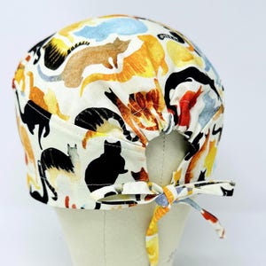 Cat surgical cap with tie back for men. Funny skull tie-back style surgical scrub hat.