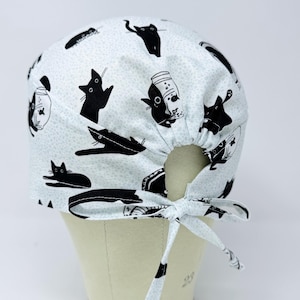 Cat surgical cap with tie back for men. Funny skull tie-back style surgical scrub hat.