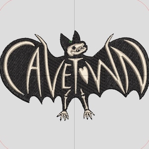 May include: Embroidered black bat with skeleton details and the word "CAVETOWN" in a stylized font. The bat's wings are spread, and the design includes a heart. The design is likely for apparel or accessories.