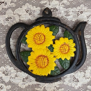 Vintage Cast Iron Sunflower Trivet / Teapot Shape / Wall Hanging or Hot Plate / Yellow Sunflower Kitchen Decor / Country Cottage Style