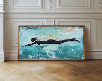 May include: A framed painting of a person swimming underwater. The painting is done in a blue and green color palette with a textured background.