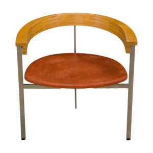 May include: A modern chair with a curved wooden backrest and a rust-colored seat. The chair has a metal frame with four legs and a support bar. The design is minimalist and stylish, suitable for various interior settings.