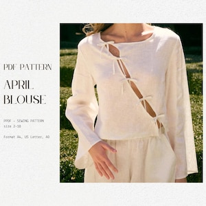 Peut inclure: Un chemisier blanc en lin à manches longues et un détail de nœud au niveau du col. Le chemisier présente une fente au niveau de la couture latérale. Le texte "PDF PATTERN APRIL BLOUSE" est visible en haut à gauche de l'image. Le texte "PPDF - SEWING PATTERN size 2-18 Format A4, US Letter, AO" est visible en bas à gauche de l'image.