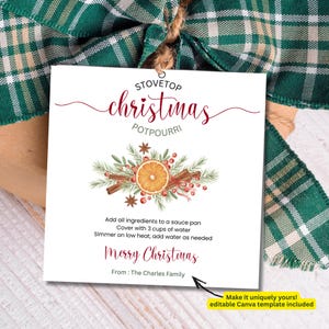 May include: A white Christmas potpourri tag with the words "Stovetop Christmas Potpourri" in red script. The tag features a watercolor illustration of orange slices, cinnamon sticks, and berries. The tag is tied with a green plaid ribbon.