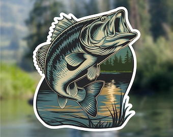 May include: A sticker featuring a detailed illustration of a largemouth bass jumping out of the water. The bass is green, black, and white with a detailed texture. The background is a blue and green landscape with a sunset reflection in the water.