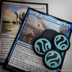 May include: Four blue and black tokens with a wave design. The tokens are on top of two Magic: The Gathering cards. The card on the left is called "Quicksilver Fountain" and the card on the right is called "Eluge, the Shoreless Sea".