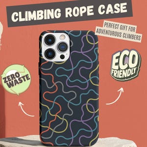 May include: A black phone case with a colorful, squiggly line pattern. The case is labeled "Climbing Rope Case" and has "Zero Waste" and "Eco Friendly" stickers. The background is a reddish-orange color.
