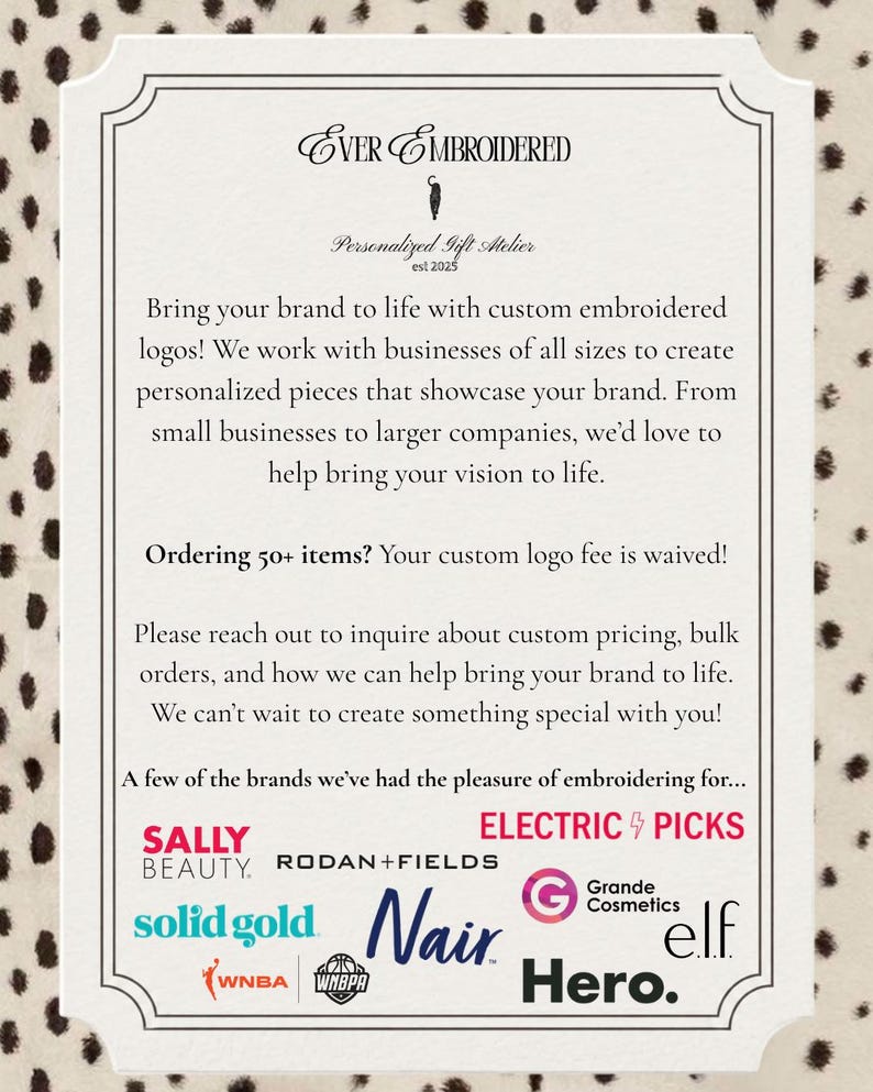 May include: A white rectangular sign with black text reading Ever Embroidered Personalized Gift Atelier est 2025. The text describes custom embroidery services for brands and lists logos including Sally Beauty, Rodan+Fields, Electric Picks, Solid Gold, Nair, Grande Cosmetics, elf, WNBA, WNBPA, and Hero.