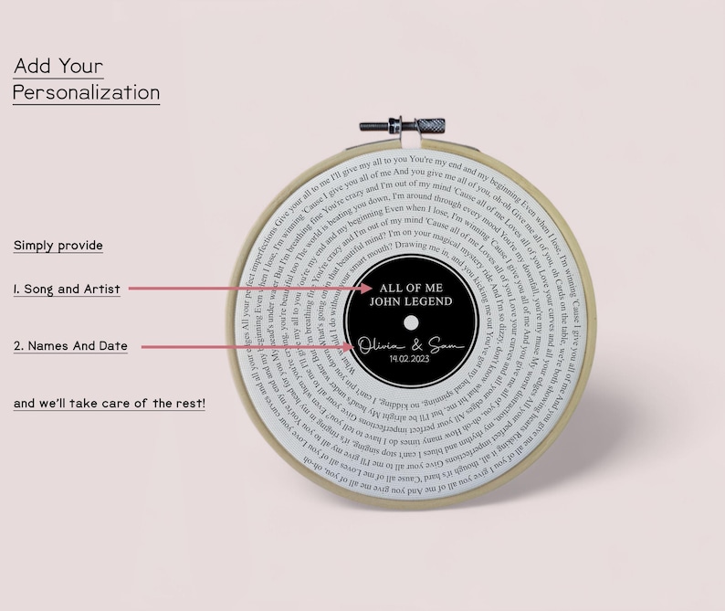 May include: A white embroidery hoop with a black and white record design. The record features the song "All of Me" by John Legend. The text "Olivia & Sam 14.02.2023" is printed on the record.