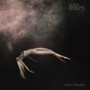 May include: A woman with long blonde hair floats in a dark space with a pink and grey nebula in the background. The text "THE PRETTY RECKLESS" is in the upper right corner and "Other Worlds" is in the lower right corner.