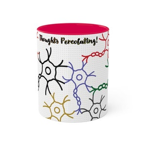 May include: White ceramic mug with a red rim. The mug features a black and white illustration of neurons with colorful connections. The text "Thoughts Percolating!" is printed in black on the mug.