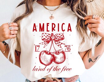 Coquette 4th of July Shirt, Cherry Bow America Tee, 1776 Independence Day Apparel, Retro Land of the Free Top, Patriotic Women Clothing