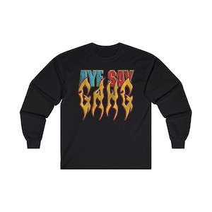 May include: Black long-sleeve t-shirt with a yellow, red, and blue graphic that says "Aye Say Gang" in a stylized font.